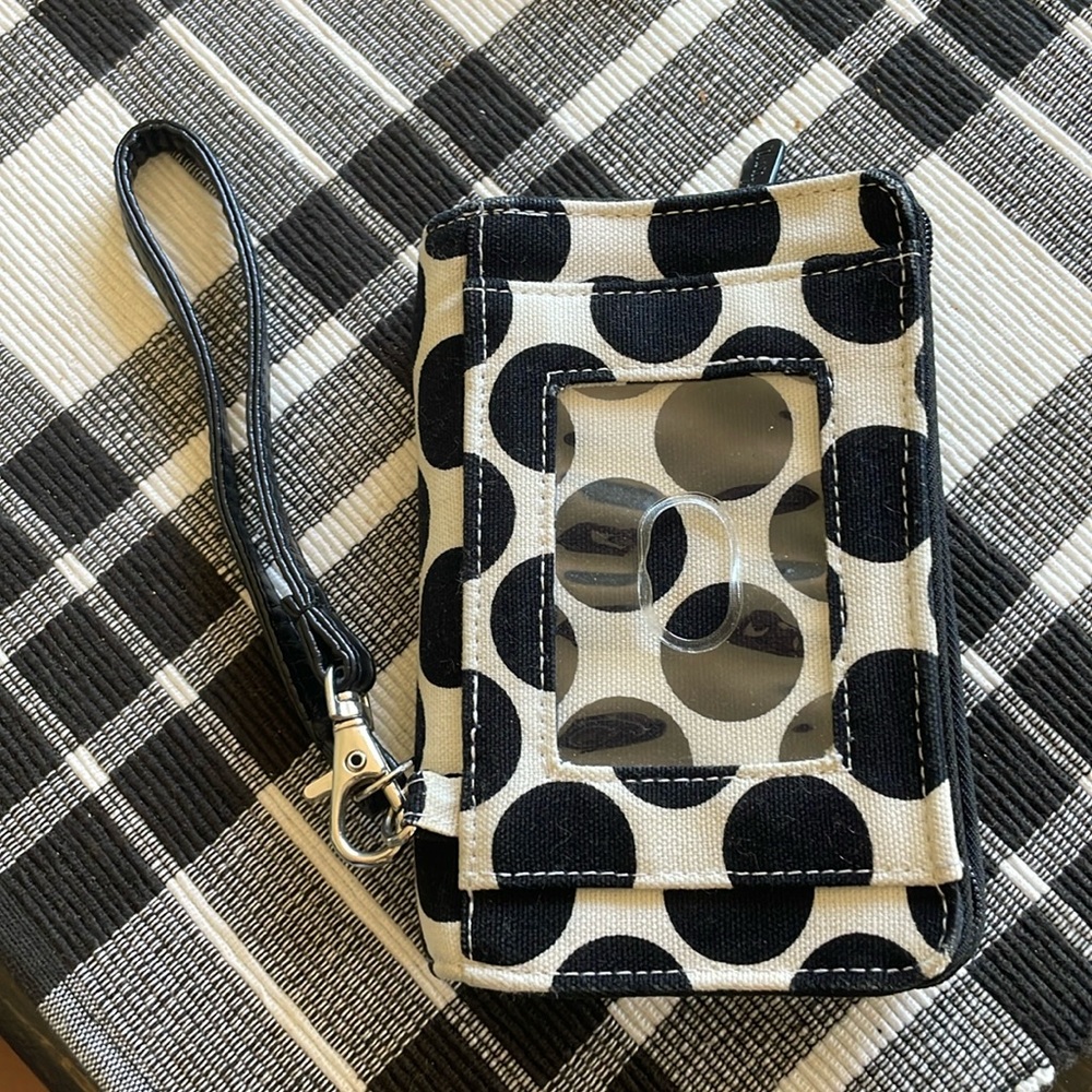 Cute 31 Wristlet. Good condition.